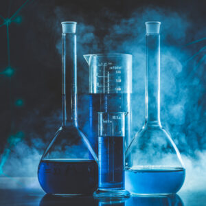 test-tube-flask-with-blue-liquid-blue-smoke-chemistry-laboratory-concept
